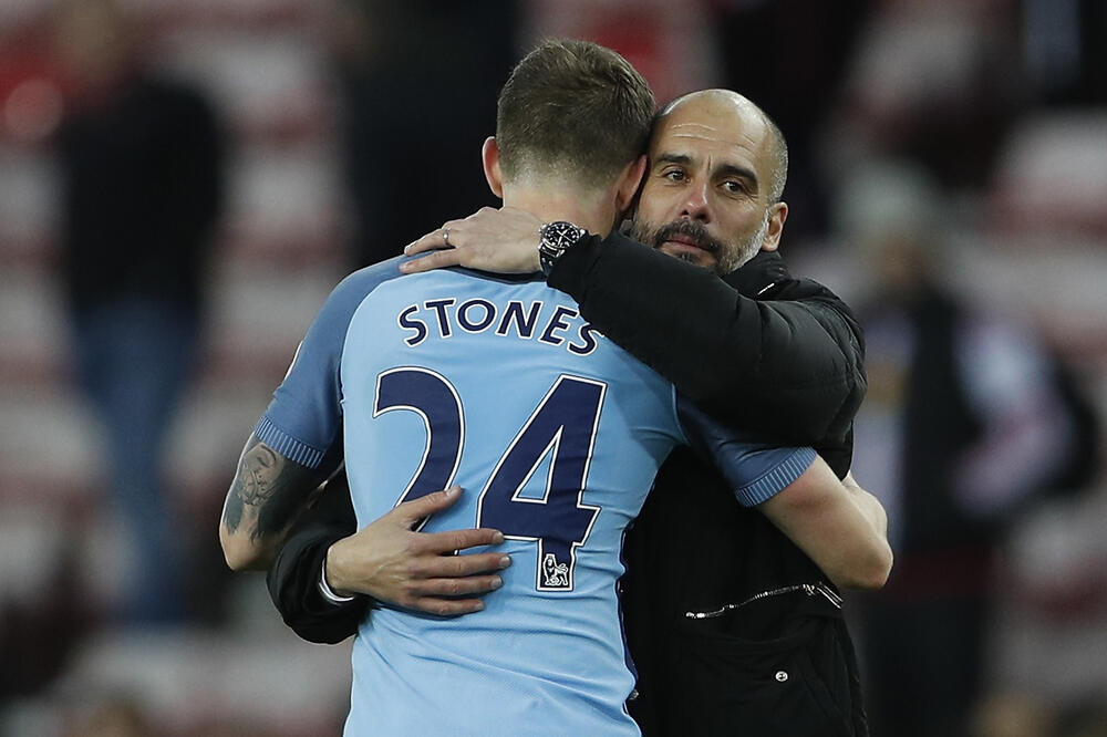 Pep Gvardiola i Džon Stouns, Foto: Reuters