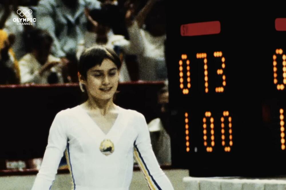 Nađa Komaneči next to the traffic light that did not recognize the grade ten, Photo: Printscreen YouTube/Olympics