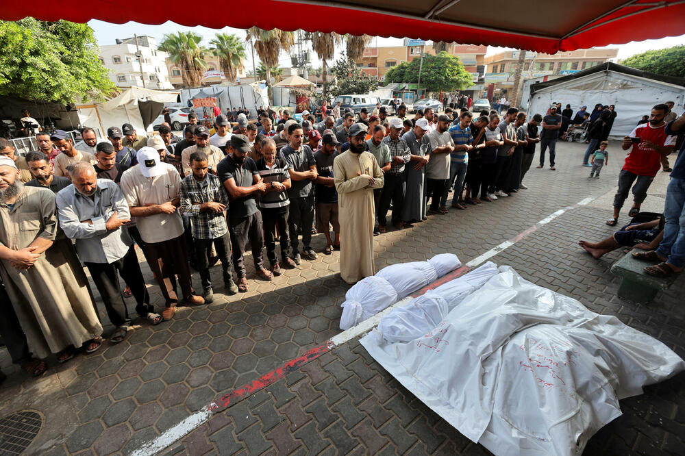 Palestinci oplakuju mrtve u Gazi, Foto: Reuters