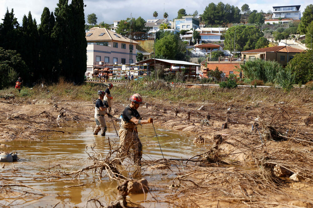 Spasioci na terenu, Foto: Reuters